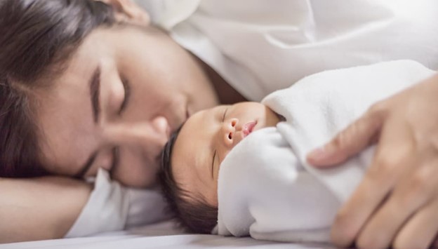 The Role of Sleep in Postpartum Mood: Tips for New Moms